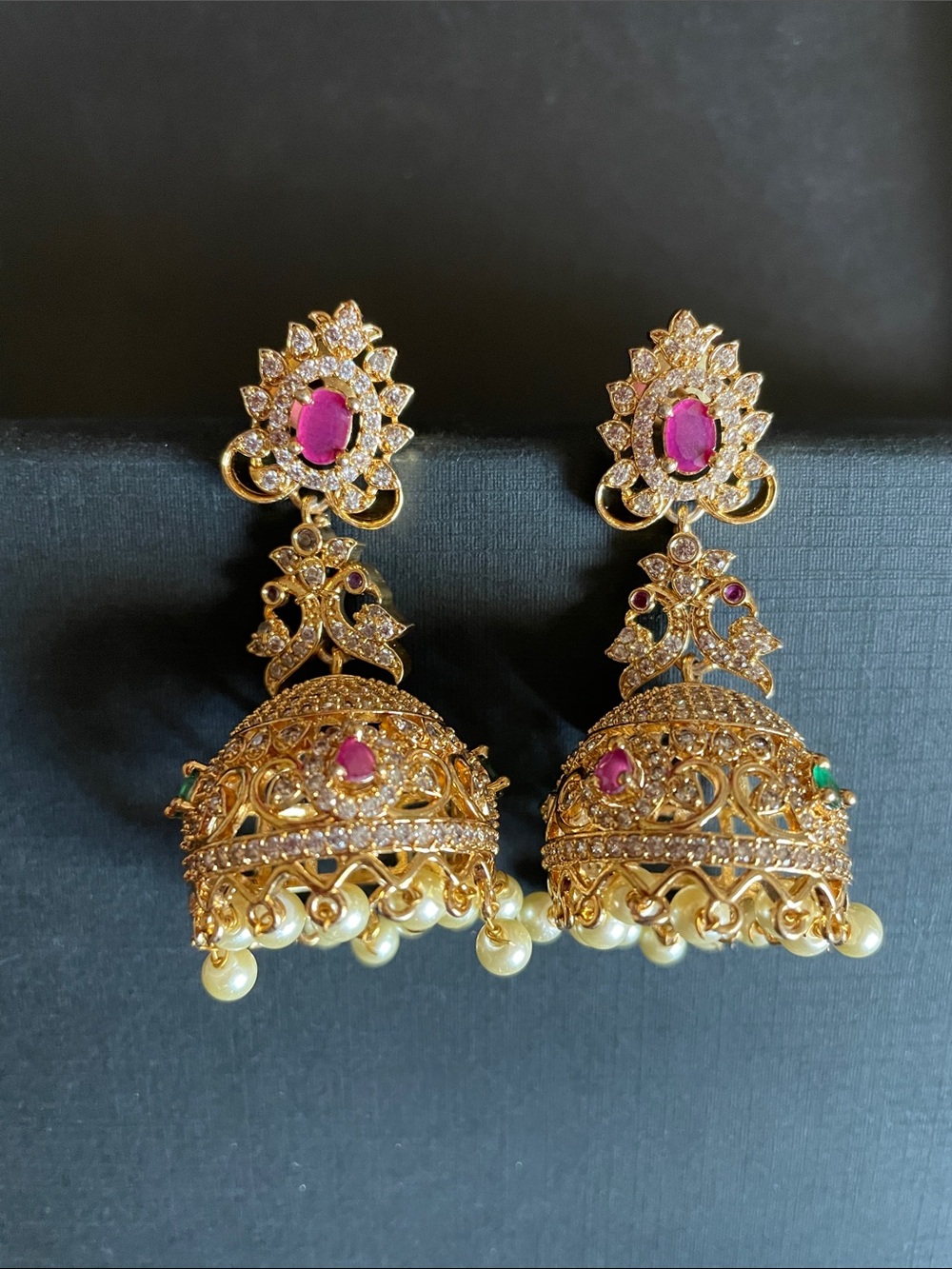 Gold-Tone Jhumka Earrings with Pink Gem Accents